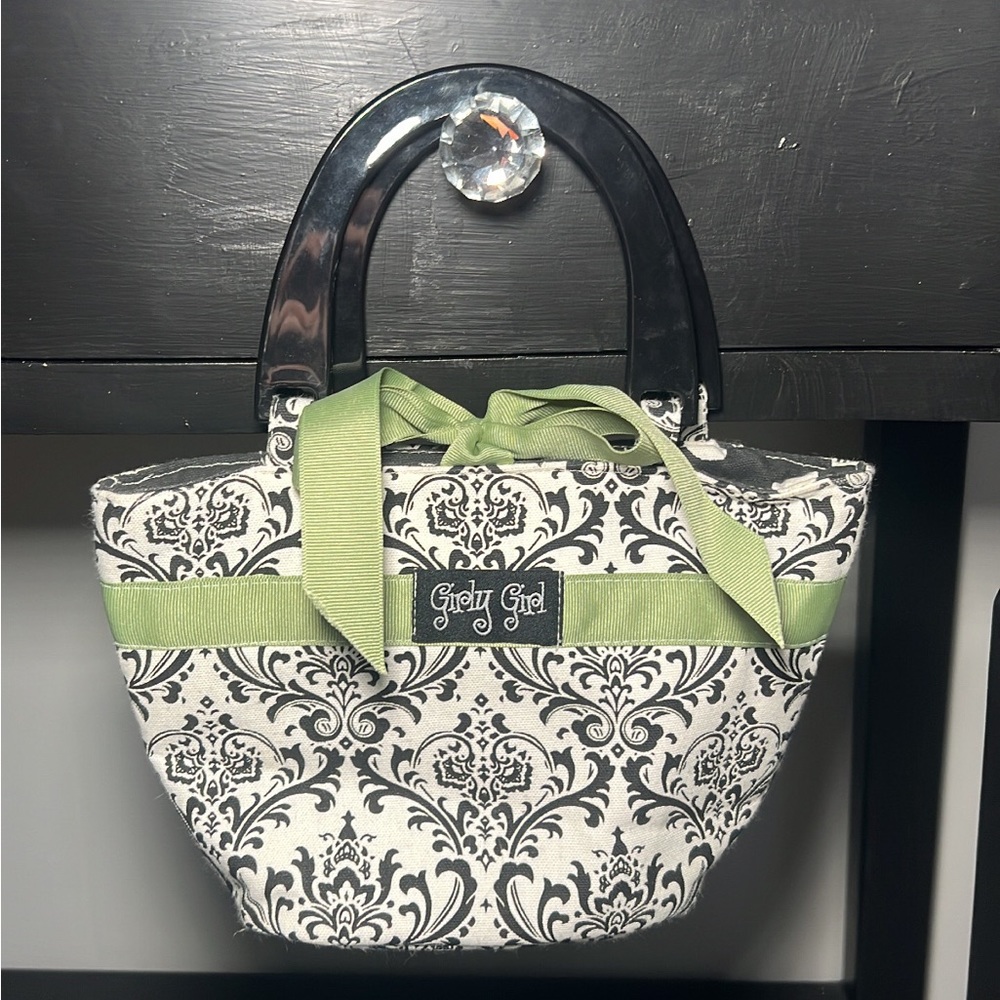 Handmade mini floral handbag with polka dot inside